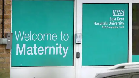 PA Media A sign outside the maternity unit at QEQM hospital in Margate.