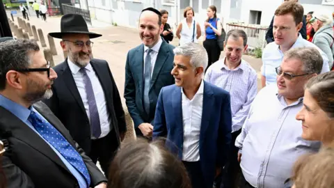 London Jewish Forum A group of people speak to the Mayor of London