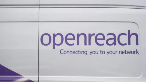 PA Media A close up of the side of a white van with the words "Openreach Connecting you to your network" in purple letters.