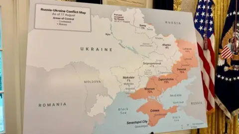 A map in the Oval Office shows occupied Ukrainian territories.