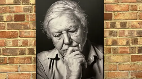 Black and white digital painting of Sir David Attenborough. In the painting, he has his hand on his chin, slightly covering his mouth. He is looking down, deep in thought. 