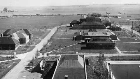 Harwell Campus A black and white photograph of a small industrial site, with a cluster of buildings, from the late 1940s. 