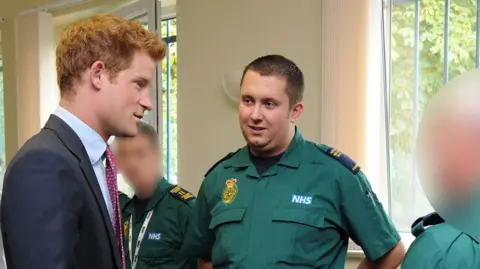PA Media Jonathan Kirk met Prince Harry after the riots in 2013