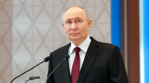Reuters Russian President Vladimir Putin speaks during a press conference in May 2026.