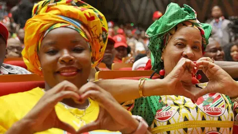 AFP supporters of Frelimo presidential candidate Daniel Chapo make gestures of love at the electoral rally in Maputo, October 2, 2024