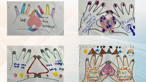 Herts Welcomes Refugees Artwork created by child refugees showing hands holding hearts and writing about their famlies