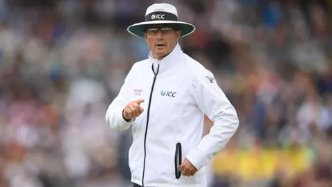 Richard Kettleborough while on umpiring duties