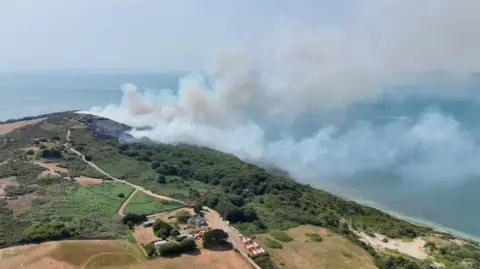 Aerial footage of heathland on fire on the Isle of Wight.