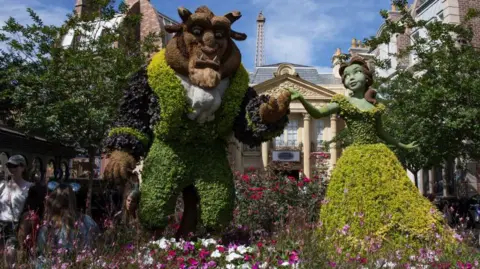 Getty Images Topiary of Bell and the Beast at Disneyland in Florida