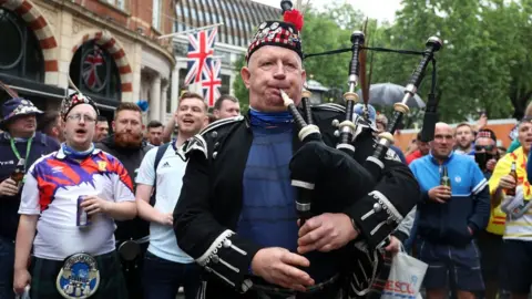 PA Media fans in Leicester Square on Friday