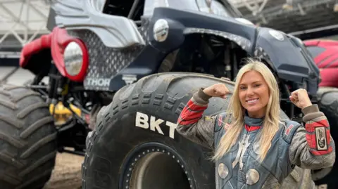 Lydia Wilson/BBC Monster Jam driver, Myranda Cozad, pictured in front of her monster truck