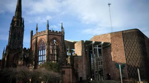 Getty Images The remains of the bombed-out original Coventry Cathedral next to its modern replacement on the right