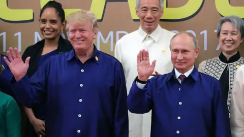 Getty Images by Donald Trump and Vladimir Putin "Family photos" November 2017 in Vietnam