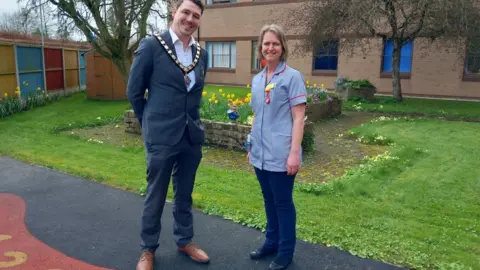 Robert Jones and Agnes Hunt Orthopaedic Hospital Jay Moore with Alice Ward Manager Suzanne Marsden