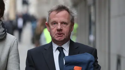 Jonathan Brady/PA Wire Pilot Andrew Hill, who was charged over the Shoreham Airshow crash, leaves the Old Bailey in London