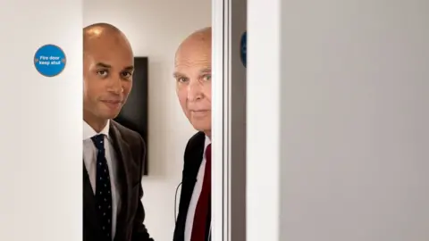 PA Chuka Umunna and Vince Cable