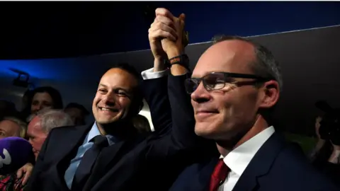 Reuters Leo Varadkar was congratulated by Simon Coveney after Friday's result