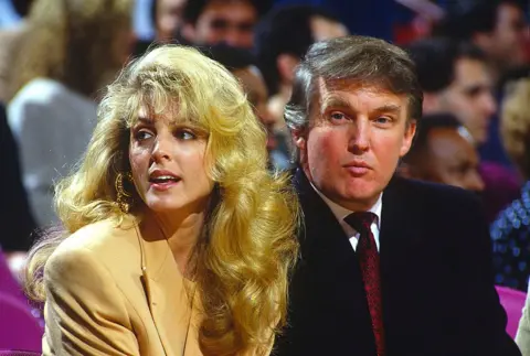Getty Images US President Donald Trump pictured at Madison Square Garden attending a New York Knicks basketball game