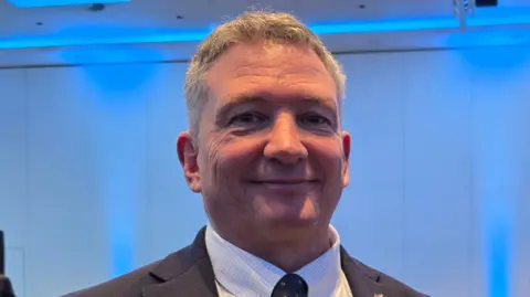 Man smiling at camera