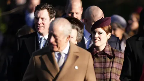 PA Media Princess Eugenie walked behind the King alongside her husband Jack Brooksbank
