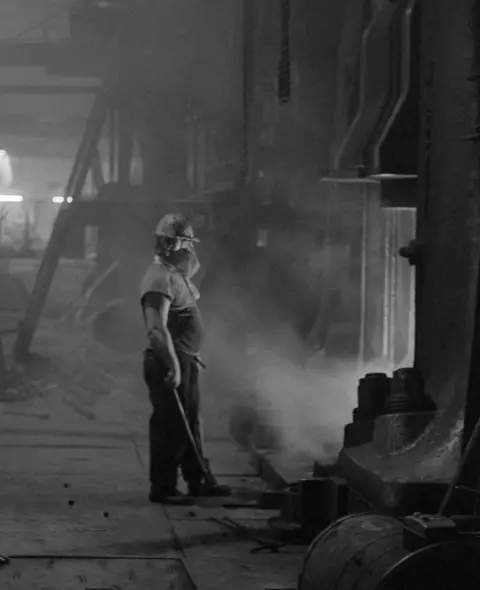 Martin Jenkinson Image Library Forge hand at George Turton Platts drop forge