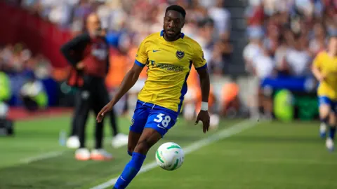 Ebou Adams chases the ball at the London Stadium