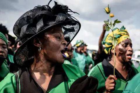 AFP Members of the ANC Women's League march to commemorate the late South African anti-apartheid campaigner Winnie Madikizela-Mandela, ex-wife of former South African president Nelson Mandela. in Soweto, Johannesburg, on April 4, 2018.