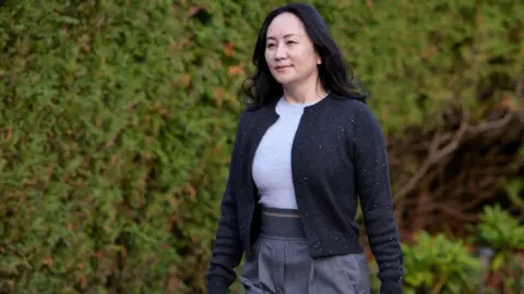 Reuters Huawei Technologies Chief Financial Officer Meng Wanzhou leaves her home to attend a court hearing in Vancouver, British Columbia, Canada, 26 October, 2020.