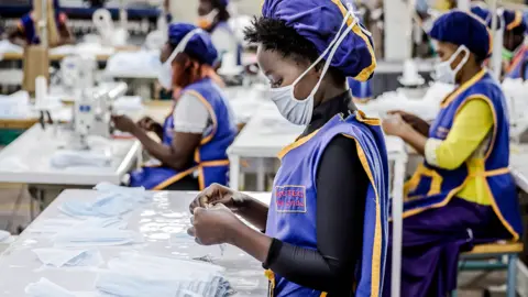 AFP Workers producing face masks the KICOTEC factory in Kitui, Kenya - Tuesday 7 April 2020