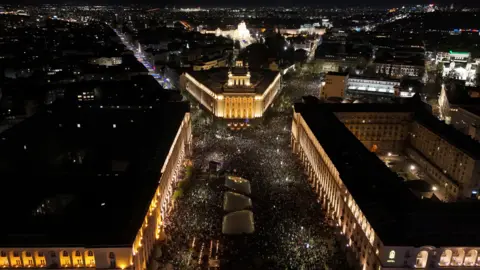 Reuters A drone view shows protesters gathering during a demonstration organised by Bulgaria’s opposition PP-DB coalition against the proposed financial framework of the country's budget, outside the parliament, in Sofia, Bulgaria, December 1, 2025.