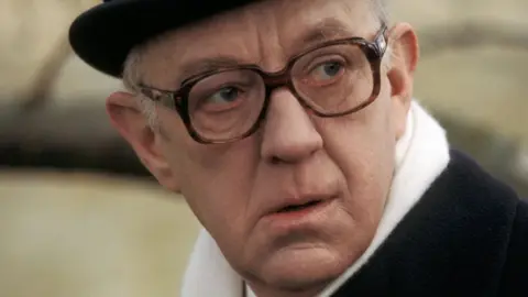 Alec Guinness as George Smiley in Tinker Tailor Soldier Spy