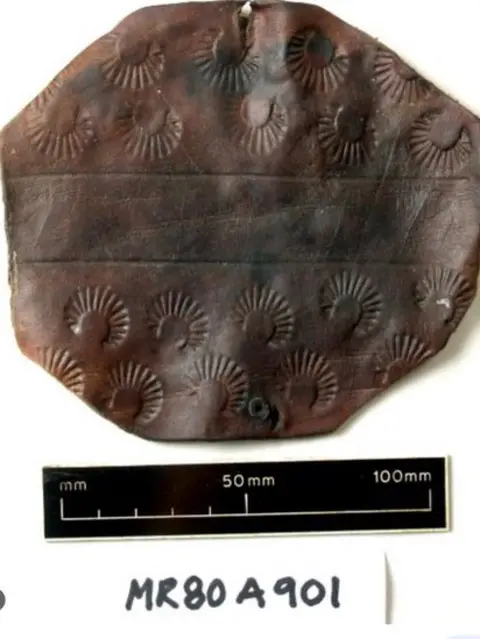 Mary Rose Trust The wrist guard found in the Mary Rose