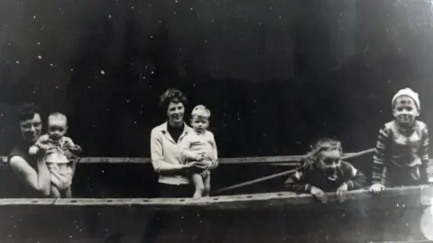 Family Handout Women on a boat
