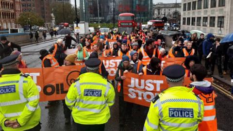 Police at a Just Stop Oil protest in central London (file photo from November)