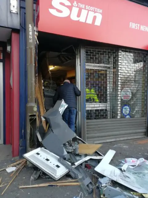Twitter/@JonjoBrannen The shop front was significantly damaged