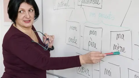 Getty Images A teacher teaching French