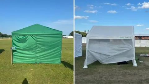 Andy Bowles A green marquee pitched on a patch of grass at the showground in Norfolk with the number 275 in front of it. On the right is a white marquee pitched on a patch of grass at the showground.