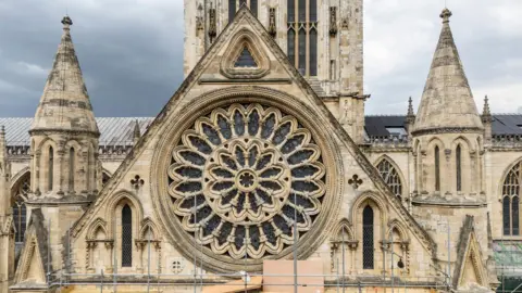 Danny Lawson/PA Wire Scaffolding is put up around the exterior of York Minster, to allow access to the Rose Window.