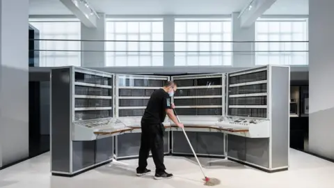 Isidora Bojovic A conservator cleans a supercomputer during lockdown at the Science Museum