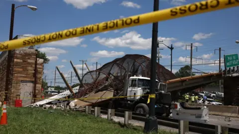 Getty Images A bridge collapsed on to a highway in Washington DC one day before the deal was struck