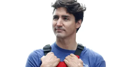 Reuters Canada"s Prime Minister Justin Trudeau looks on after he paddled a kayak to mark World Environment Day on the Niagara River, in Niagara-on-the-Lake, Ontario, Canada June 5, 2017