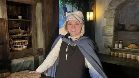 Actor Ashley Henderson playing a barkeeper at the re-opened Canterbury Tales