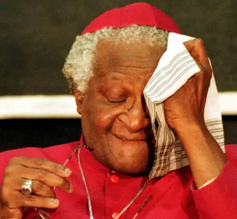 Reuters Archbishop Desmond Tutu wipes away tears during the TRC hearings