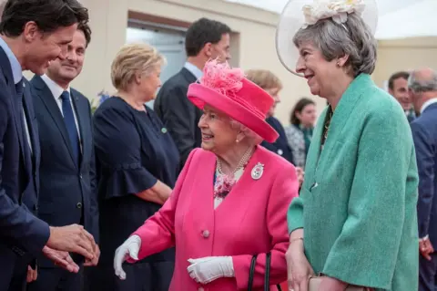 Reuters Prime Minister Theresa May introduced the Queen to the gathered world leaders, including Canada's Prime Minister Justin Trudeau, seen above on left