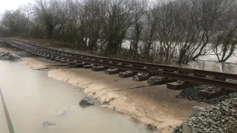 Network Rail Conwy Valley Line rail lines with track bed washed away by storms