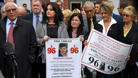 Getty Images Family members affected by the 1989 Hillsborough disaster, Warrington, 2017