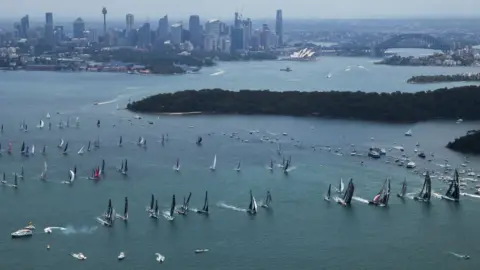 Getty Images Yachts sail during the 2021 Sydney to Hobart