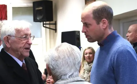 Anne Roberts Prince William talking to members of the public