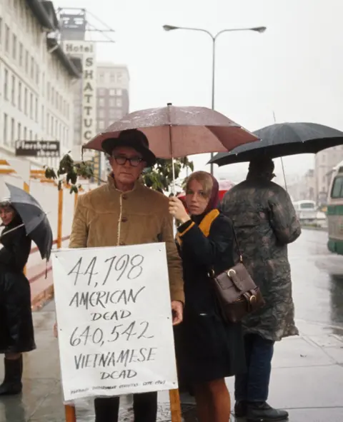 Getty Images Demonstrators hold signs in Berkeley, California