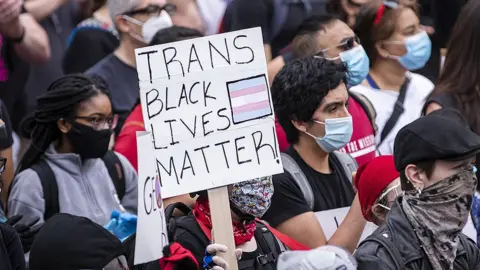 Getty Images Black trans lives matter banner at George Floyd protest